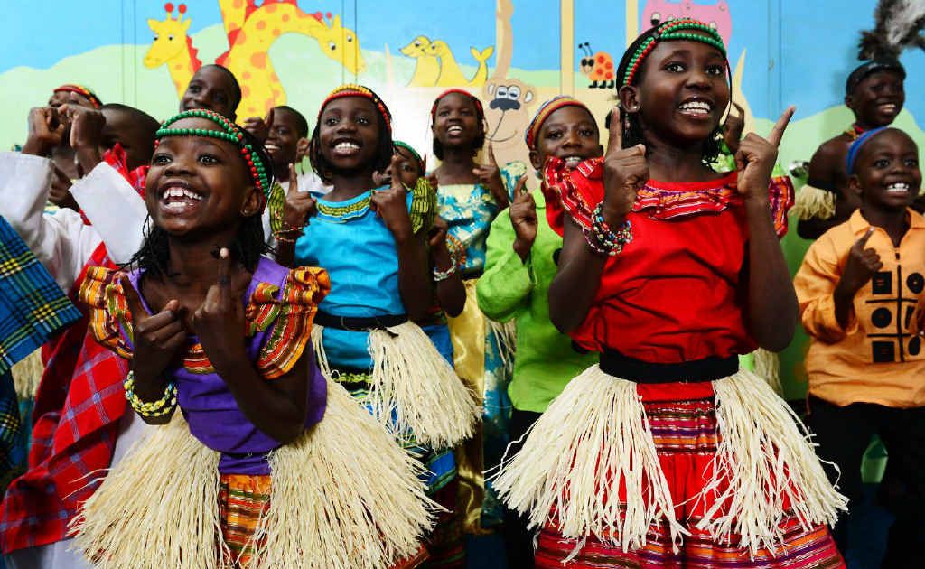 Alimo Prossy (front left) and Namusoke Regina (front right) perform with the Watoto Children's Choir at the Central Church Ipswich. Alimo Prossy (front left) and Namusoke Regina (front right) perform with the Watoto Children's Choir at the Central Church Ipswich.