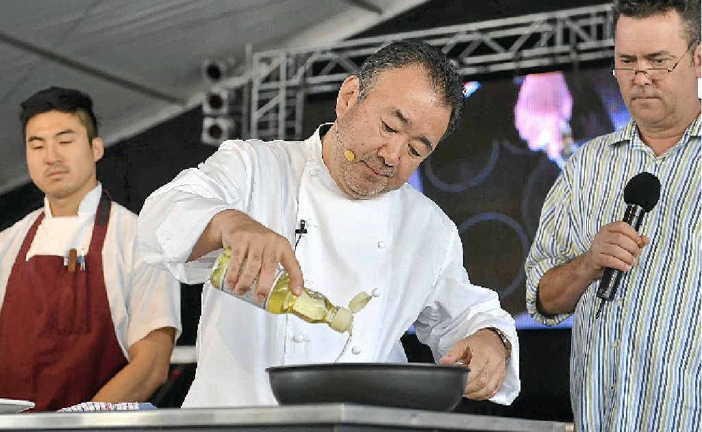 Tetsuya Wakuda puts on a show for the crowd at the Noosa Food and Wine Festival. Tetsuya Wakuda puts on a show for the crowd at the Noosa Food and Wine Festival.