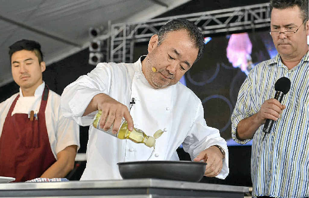Tetsuya Wakuda puts on a show for the crowd at the Noosa Food and Wine Festival. Tetsuya Wakuda puts on a show for the crowd at the Noosa Food and Wine Festival.