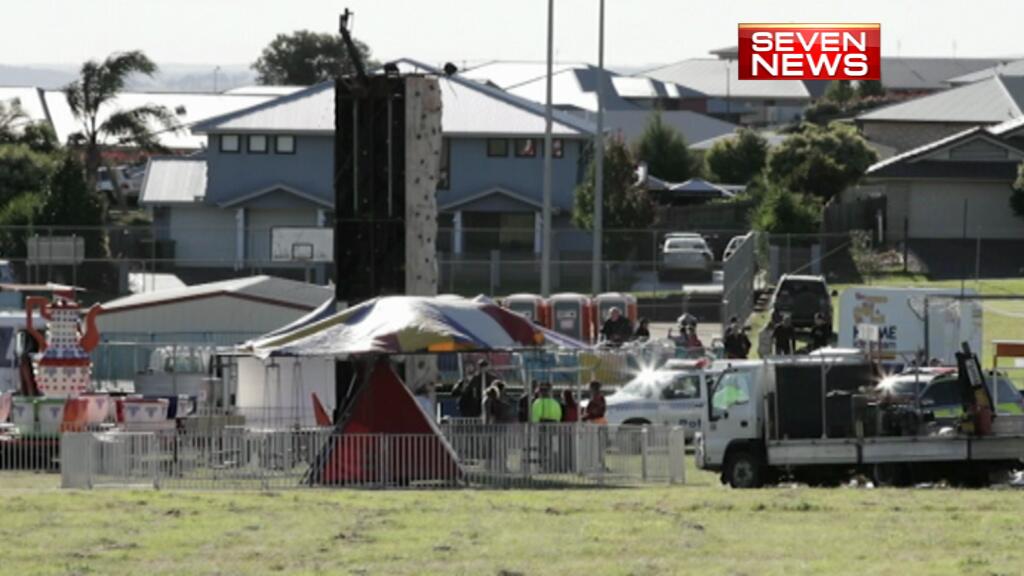 The scene at the Highfields fete after a five-year-old boy fell 10m from a ride. Image: Channel 7 The scene at the Highfields fete after a five-year-old boy fell 10m from a ride. Image: Channel 7