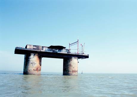 The tiny country of Sealand is no bigger than a couple of tennis courts. The tiny country of Sealand is no bigger than a couple of tennis courts.