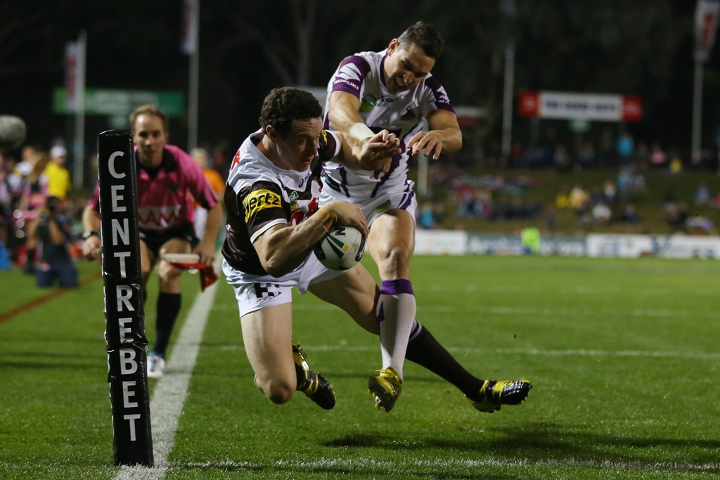David Simmons of the Panthers beats the tackle of Billy Slater of the Storm to score a try during the round nine NRL match between the Penrith Panthers and the Melbourne Storm at Centrebet Stadium on May 12, 2013 in Penrith, Australia. David Simmons of the Panthers beats the tackle of Billy Slater of the Storm to score a try during the round nine NRL match between the Penrith Panthers and the Melbourne Storm at Centrebet Stadium on May 12, 2013 in Penrith, Australia.