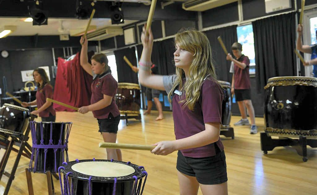 BOOMTOWN: Michaela Buccholz,13, Kayla Channel, 12, Chloe Long, 14, Charmaine Brady, 14, Bradley Read, 12 and Kaitlyn Read, 14 from Toolooa State High rehearse on the Taiko drums. BOOMTOWN: Michaela Buccholz,13, Kayla Channel, 12, Chloe Long, 14, Charmaine Brady, 14, Bradley Read, 12 and Kaitlyn Read, 14 from Toolooa State High rehearse on the Taiko drums.