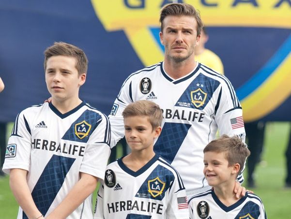 David Beckham with Brooklyn, Romeo and Cruz.
David Beckham with Brooklyn, Romeo and Cruz.