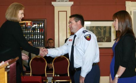 Queensland Governor Penelope Wensley (left) presents Stewart Dundas and his niece Zoe Kerr with commendation for bravery medals yesterday. Photo: Stu Riley Queensland Governor Penelope Wensley (left) presents Stewart Dundas and his niece Zoe Kerr with commendation for bravery medals yesterday. Photo: Stu Riley