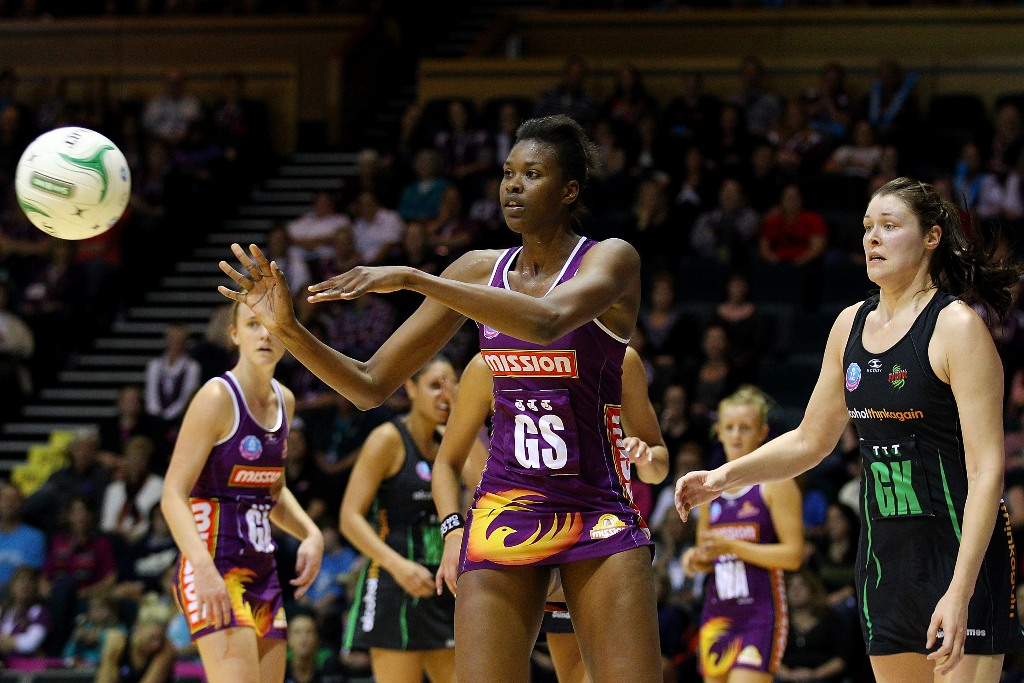 Romelda Aiken of the Firebirds passes during the round 13 ANZ Championship match between the Firebirds and the Fever at Brisbane Convention & Exhibition Centre on June 24, 2012 in Brisbane, Australia. Romelda Aiken of the Firebirds passes during the round 13 ANZ Championship match between the Firebirds and the Fever at Brisbane Convention & Exhibition Centre on June 24, 2012 in Brisbane, Australia.