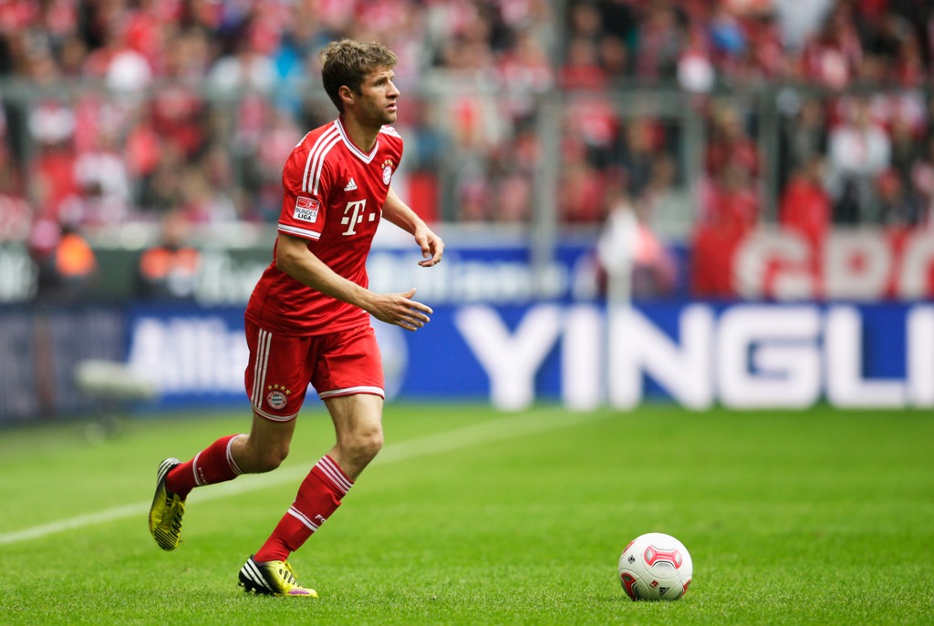Thomas Mueller of Muenchen controls the ball during the Bundesliga match between FC Bayern Muenchen and FC Augsburg at Allianz Arena on May 11, 2013 in Munich, Germany. Thomas Mueller of Muenchen controls the ball during the Bundesliga match between FC Bayern Muenchen and FC Augsburg at Allianz Arena on May 11, 2013 in Munich, Germany.
