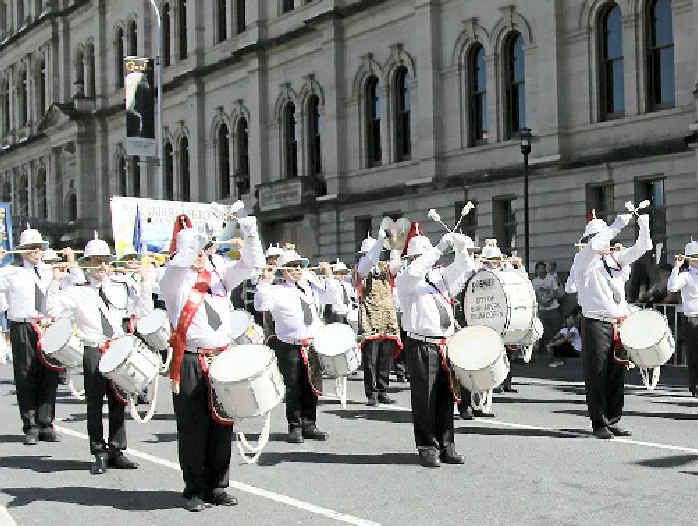 NEED THE BEAT: Bundaberg Drum Corps march in the Brisbane Anzac Day 2013 parade.