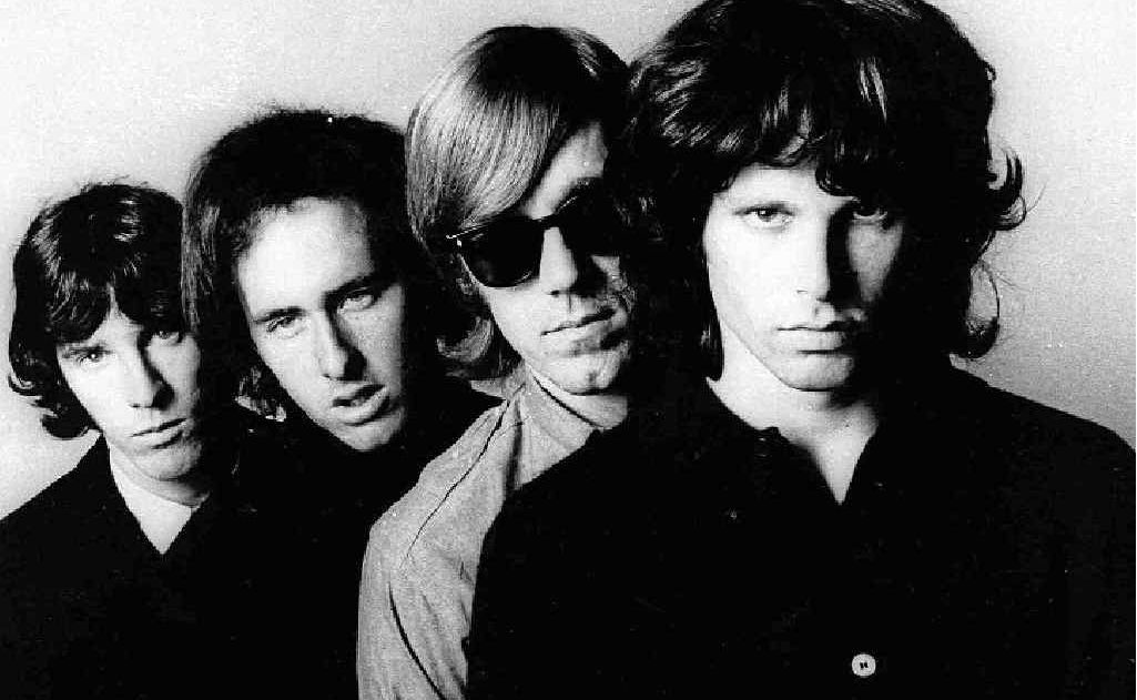 Ray Manzarek, second from right, flanked by his fellow band members Jim Morrison, far right, John Densmore, far left, and Robbie Kreiger. Ray Manzarek, second from right, flanked by his fellow band members Jim Morrison, far right, John Densmore, far left, and Robbie Kreiger.