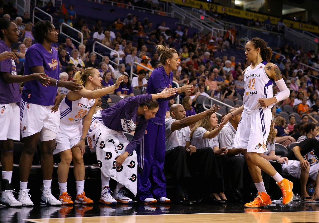 Brittney Griner #42 of the Phoenix Mercury high fives teammates on the bench as she checks out of the preseason WNBA game against Japan at US Airways Center on May 19, 2013 in Phoenix, Arizona. Brittney Griner #42 of the Phoenix Mercury high fives teammates on the bench as she checks out of the preseason WNBA game against Japan at US Airways Center on May 19, 2013 in Phoenix, Arizona.