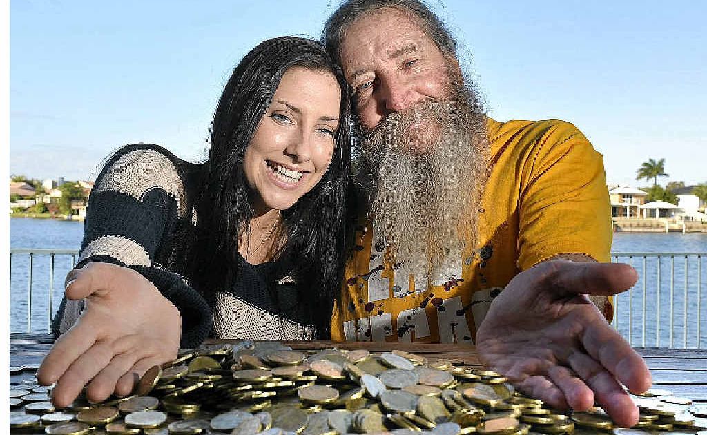 Lucinda Dunne collects her $1000 promise from her father, Tony Dunne, on her 21st birthday. Lucinda Dunne collects her $1000 promise from her father, Tony Dunne, on her 21st birthday.