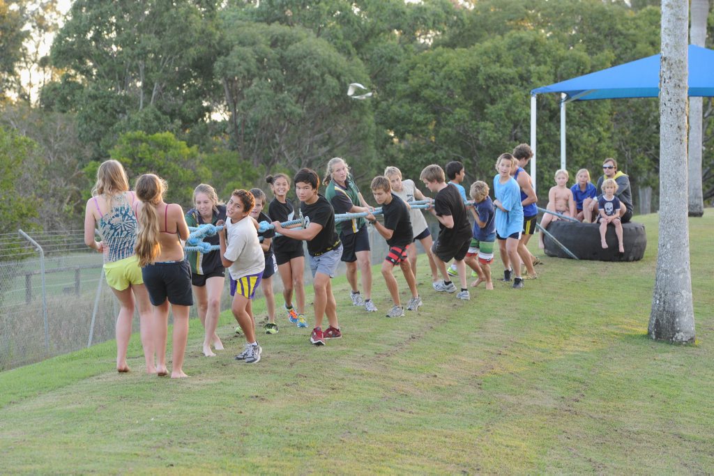 Hervey Bay Swimming Club members are hauling tyres for training while the heated pool is out of action. Hervey Bay Swimming Club members are hauling tyres for training while the heated pool is out of action.
