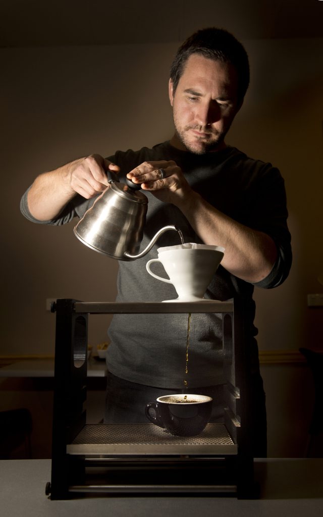 Findo's Cafe owner Tim Burstow prepares a pour over coffee. Findo's Cafe owner Tim Burstow prepares a pour over coffee.