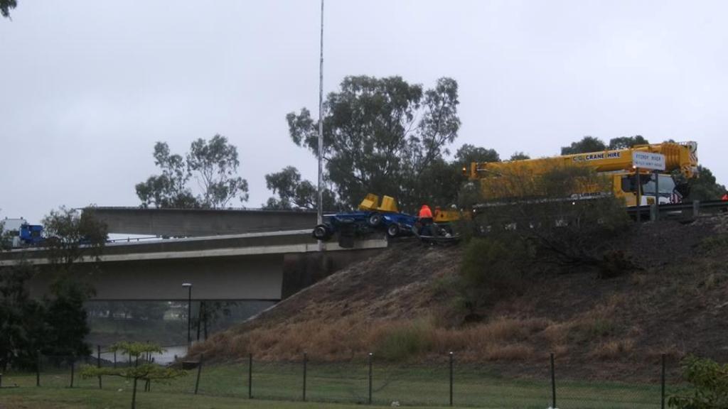 The Bulletin reader Paul Royds took this image this morning of the truck, wide-load, jack-knife incident which caused massive traffic chaos in Rockhampton as the southbound lane of the new (Neville Hewitt) Bridge was closed from about 5am to after 10am. The Bulletin reader Paul Royds took this image this morning of the truck, wide-load, jack-knife incident which caused massive traffic chaos in Rockhampton as the southbound lane of the new (Neville Hewitt) Bridge was closed from about 5am to after 10am.