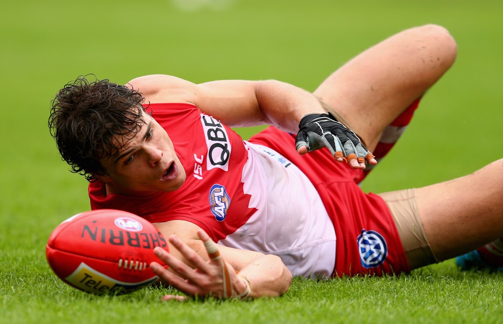 Mike Pyke of the Swans controls the ball during the round two AFL match between the Sydney Swans and the Gold Coast Suns at SCG on April 6, 2013 in Sydney, Australia. Mike Pyke of the Swans controls the ball during the round two AFL match between the Sydney Swans and the Gold Coast Suns at SCG on April 6, 2013 in Sydney, Australia.