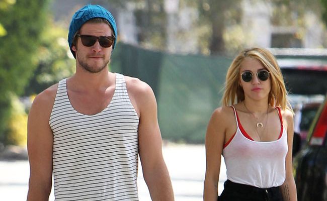 Liam Hemsworth and Miley Cyrus. Liam Hemsworth and Miley Cyrus.