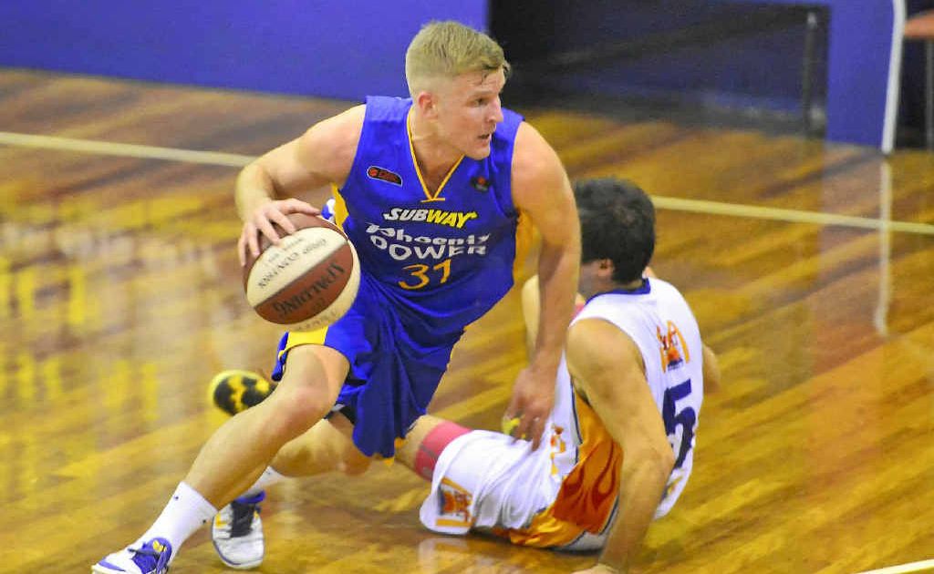 ON THE CHARGE: Power’s Shaun Gleeson moves up-court against the Townsville Flames at Kev Broome Stadium, Gladstone. ON THE CHARGE: Power’s Shaun Gleeson moves up-court against the Townsville Flames at Kev Broome Stadium, Gladstone.