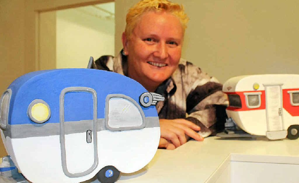 CONTAINER OF DREAMS: Tabulam artist Clare Urquhart and two of her ceramic caravans currently on display at the Northern Rivers Community Gallery in Ballina. CONTAINER OF DREAMS: Tabulam artist Clare Urquhart and two of her ceramic caravans currently on display at the Northern Rivers Community Gallery in Ballina.