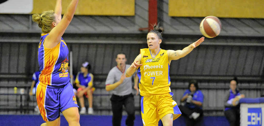 Power’s Natalie Hurst passes. Power’s Natalie Hurst passes.