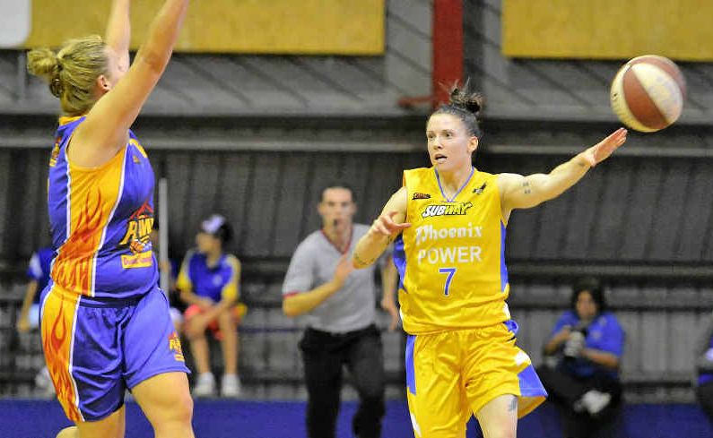 Power’s Natalie Hurst passes. Power’s Natalie Hurst passes.