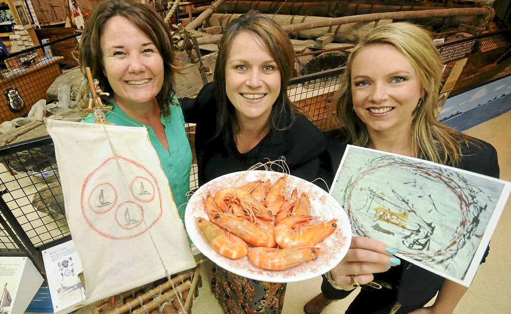 FESTIVAL LAUNCH: At this week’s launch of the “Ballina Prawn Festival celebrating 40 years of Las Balsas rafts expedition” (from left) consultant Kim Potter, co-ordinator Nadia Eliott-Burgess from the Ballina Chamber of Commerce and consultant Kelly Morton, with a print of a missing Salvador Dali painting which was on the raft expedition. FESTIVAL LAUNCH: At this week’s launch of the “Ballina Prawn Festival celebrating 40 years of Las Balsas rafts expedition” (from left) consultant Kim Potter, co-ordinator Nadia Eliott-Burgess from the Ballina Chamber of Commerce and consultant Kelly Morton, with a print of a missing Salvador Dali painting which was on the raft expedition.