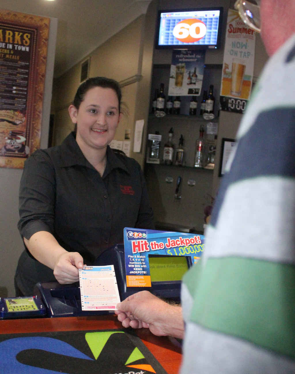 CQ Leagues Club bartender Nadine Henderson receives a winning ticket from the lucky $1.6 million Keno winner in Rockhampton. CQ Leagues Club bartender Nadine Henderson receives a winning ticket from the lucky $1.6 million Keno winner in Rockhampton.