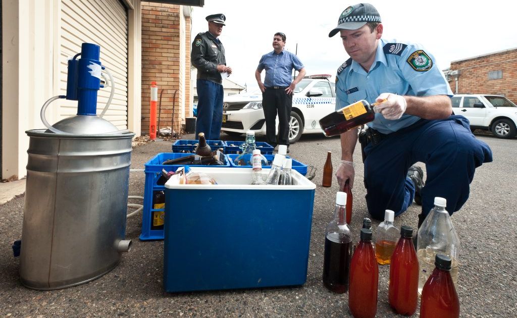 Police executed a search warrant on a Boambee house on Thursday and allegedly found an illegal distil. Police executed a search warrant on a Boambee house on Thursday and allegedly found an illegal distil.