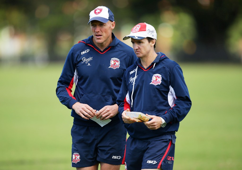 Roosters assistant coaches Craig Fitzgibbon (L) and Jason Taylor (R) look on during a Sydney Roosters NRL training session at Moore Park on March 19, 2013 in Sydney, Australia. Roosters assistant coaches Craig Fitzgibbon (L) and Jason Taylor (R) look on during a Sydney Roosters NRL training session at Moore Park on March 19, 2013 in Sydney, Australia.