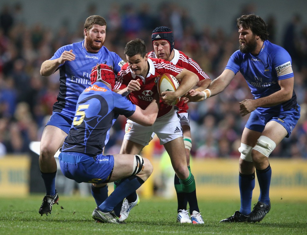Johnny Sexton of the Lions is tackled during the tour match between the Western Force and the British & Irish Lions at Patersons Stadium on June 5, 2013 in Perth, Australia. Johnny Sexton of the Lions is tackled during the tour match between the Western Force and the British & Irish Lions at Patersons Stadium on June 5, 2013 in Perth, Australia.
