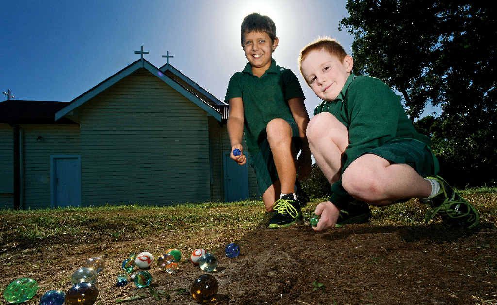 Riley Pappin, 11, (left) and Jordan O’Hearn, 7, of Brunswick Heads Primary School practise for this weekend’s annual marbles competition. Riley Pappin, 11, (left) and Jordan O’Hearn, 7, of Brunswick Heads Primary School practise for this weekend’s annual marbles competition.