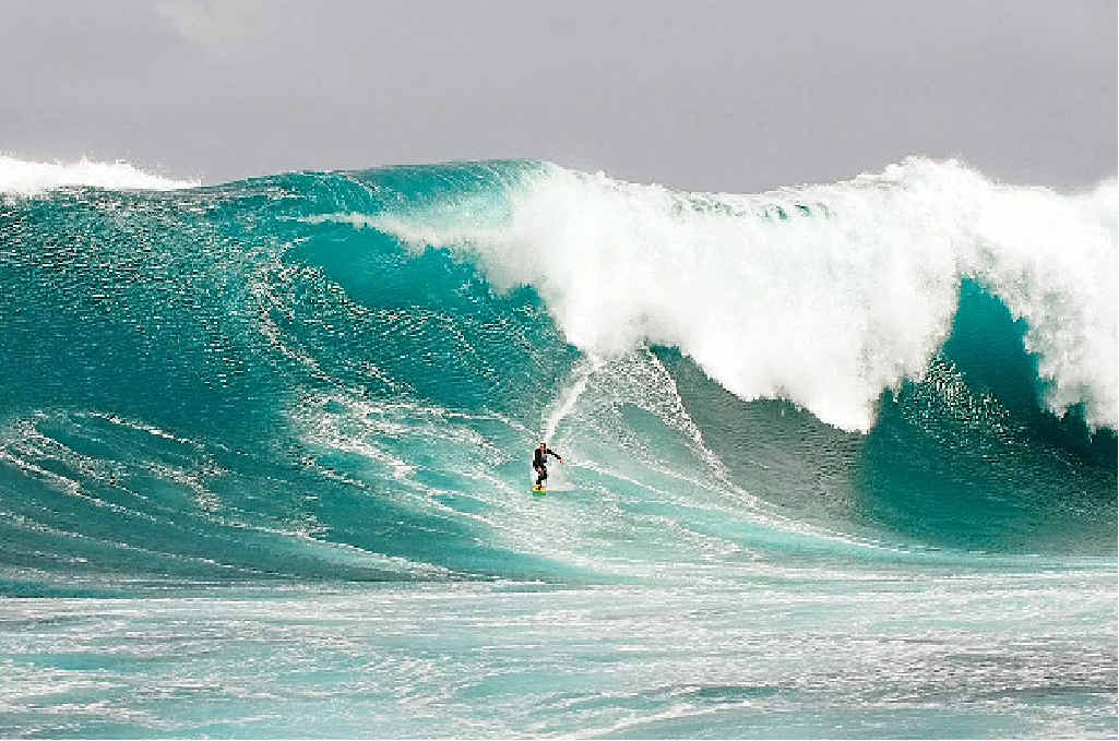 THE MAN’S MAD: Sunshine Coast surfer Mark Visser rides an 11m wave at Cow Bombie, 2.5km offshore from Grace Town, Western Australia. THE MAN’S MAD: Sunshine Coast surfer Mark Visser rides an 11m wave at Cow Bombie, 2.5km offshore from Grace Town, Western Australia.