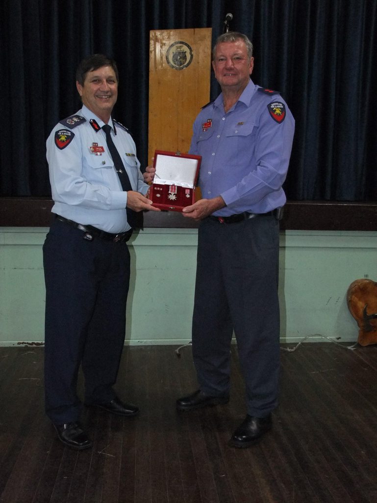 OUTSTANDING SERVICE: Queensland Fire and Rescue Service Commissioner Lee Johnson presents Captain Roger Stubbs with the Commissioner's Distinguished Service Medal Photo George Smith / Central & North Burnett Times OUTSTANDING SERVICE: Queensland Fire and Rescue Service Commissioner Lee Johnson presents Captain Roger Stubbs with the Commissioner's Distinguished Service Medal Photo George Smith / Central & North Burnett Times