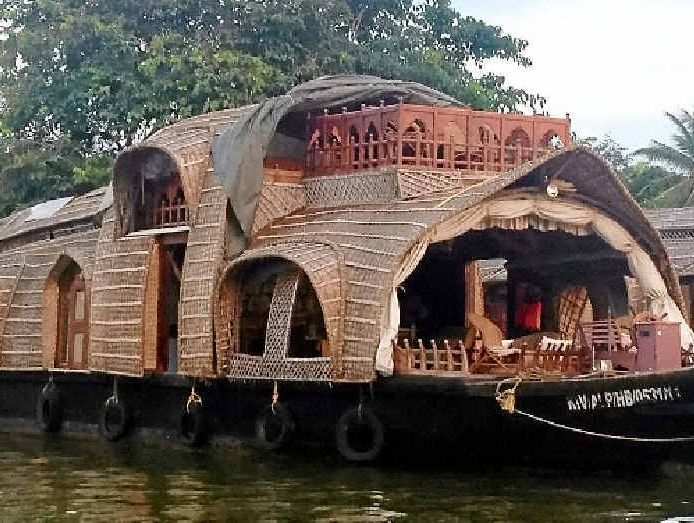 An Indian houseboat to call home while cruising the Kerala river, relaxing while watching Indian village life and the world pass by. An Indian houseboat to call home while cruising the Kerala river, relaxing while watching Indian village life and the world pass by.