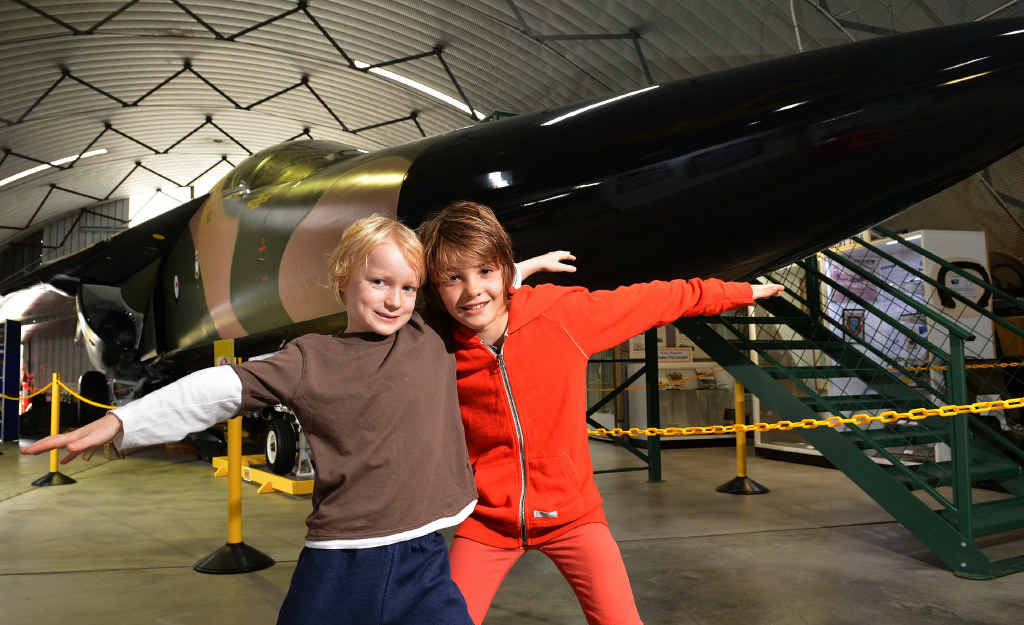 Charlie Ciavarella, 10, of Peregian, and his cousin Tom Moles, 7, of Boreen Point, “take off” as they have a good look at the F-111. Charlie Ciavarella, 10, of Peregian, and his cousin Tom Moles, 7, of Boreen Point, “take off” as they have a good look at the F-111.