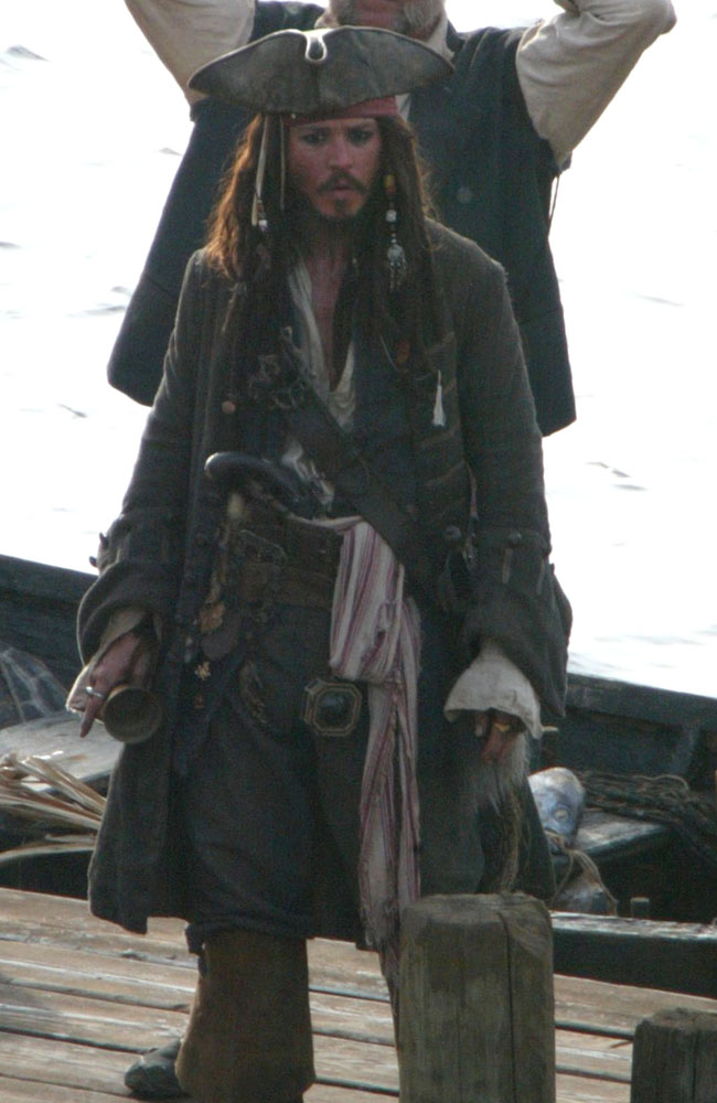 Johnny Depp as Captain Jack Sparrow Johnny Depp as Captain Jack Sparrow