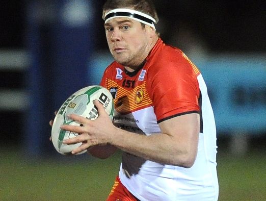Remi Casty of Catalan Dragons attacks during the Super League match between London Broncos and Catalan Dragons at Molesey Road on March 28, 2013 in Hersham, England. Remi Casty of Catalan Dragons attacks during the Super League match between London Broncos and Catalan Dragons at Molesey Road on March 28, 2013 in Hersham, England.