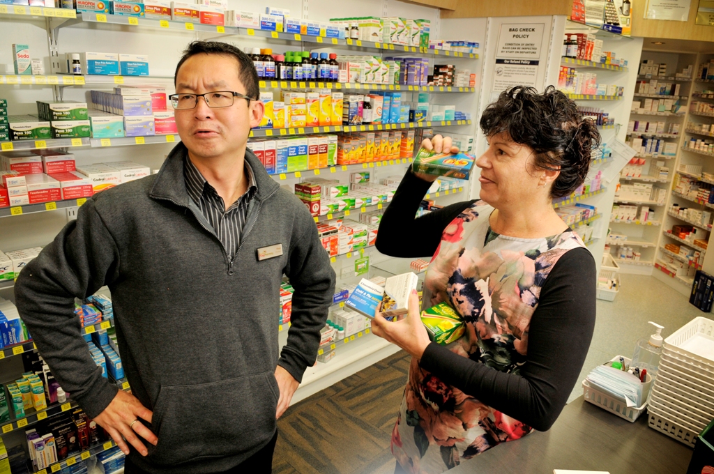 Pharmacist Fred Yeow and assistant Colleen Barham talk about man flu. Pharmacist Fred Yeow and assistant Colleen Barham talk about man flu.
