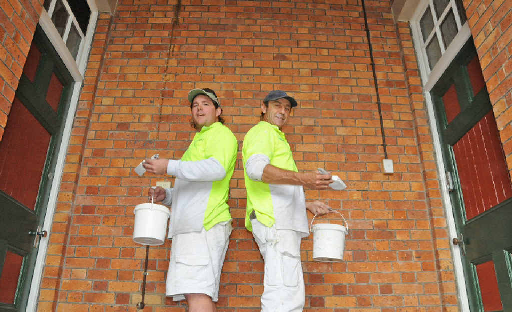 Arron Marschke and Steve Adam give the Heritage listed court house a coat of paint. Arron Marschke and Steve Adam give the Heritage listed court house a coat of paint.