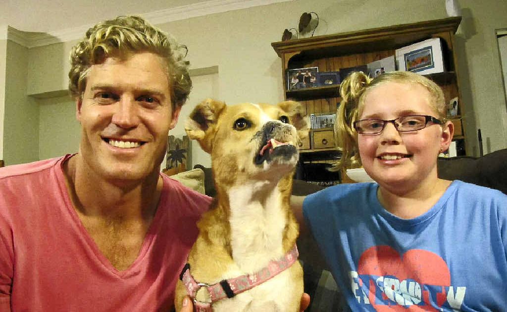 Bondi Vet television host Chris Brown with India Davies and Poppy, who has left behind her life on the streets of Fiji and has a new home in Peregian Springs. Bondi Vet television host Chris Brown with India Davies and Poppy, who has left behind her life on the streets of Fiji and has a new home in Peregian Springs.