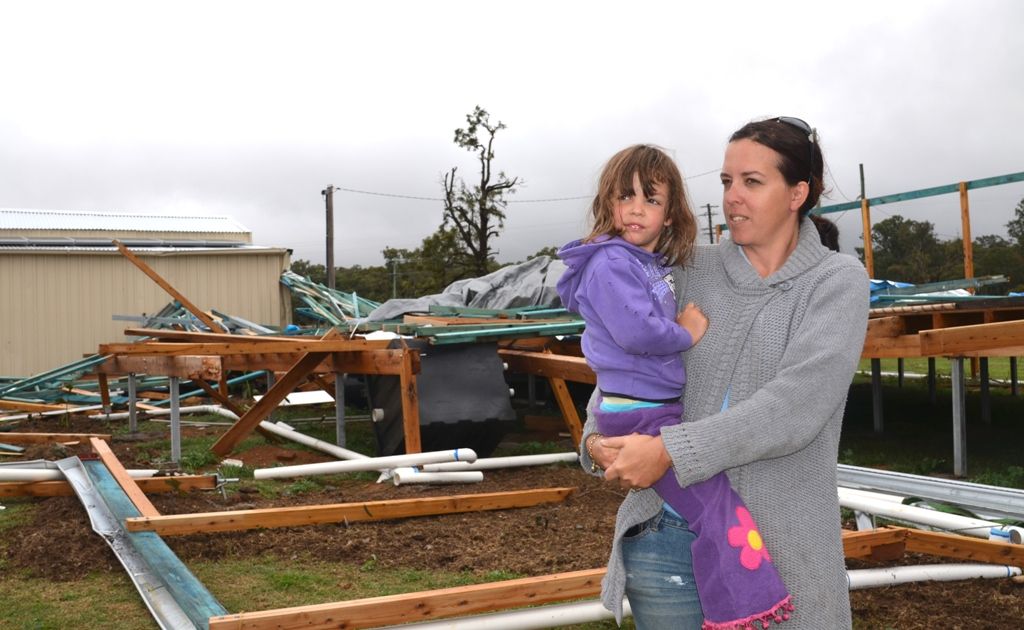Pratten’s Melissa Short and her daughter Ayla, 4, explore the aftermath of the storm that destroyed their home. Pratten’s Melissa Short and her daughter Ayla, 4, explore the aftermath of the storm that destroyed their home.