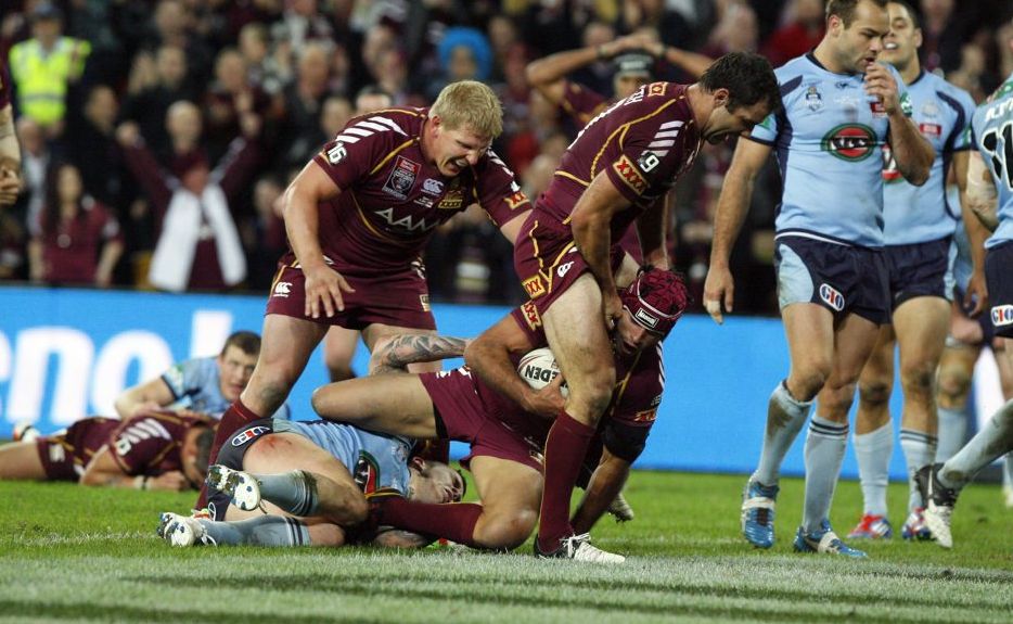 Johnathan Thurston is congratulated by Corey Parker and Ben Hannant after scoring Queensland's second try during the State of Origin decider game at Suncorp Stadium on Wednesday, June 4, 2012. Johnathan Thurston is congratulated by Corey Parker and Ben Hannant after scoring Queensland's second try during the State of Origin decider game at Suncorp Stadium on Wednesday, June 4, 2012.