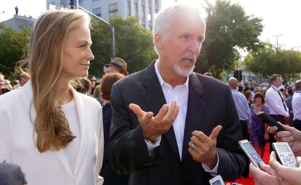 Director James Cameron and his wife Suzy Amis on the red carpet of The Hobbit: An Unexpected Journey world premiere. Director James Cameron and his wife Suzy Amis on the red carpet of The Hobbit: An Unexpected Journey world premiere.