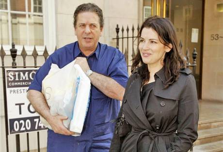 Nigella Lawson and her husband Charles Saatchi pictured in 2010 Nigella Lawson and her husband Charles Saatchi pictured in 2010