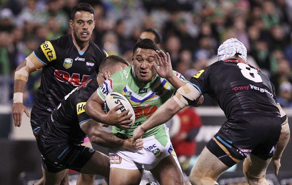 Josh Papalii of the Raiders is tackled during the round 14 NRL match between the Canberra Raiders and the Penrith Panthers at Canberra Stadium on June 15, 2013 in Canberra, Australia. Josh Papalii of the Raiders is tackled during the round 14 NRL match between the Canberra Raiders and the Penrith Panthers at Canberra Stadium on June 15, 2013 in Canberra, Australia.