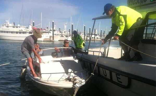 Peter Kelly and Greg Moore are grateful to be on dry land. Peter Kelly and Greg Moore are grateful to be on dry land.