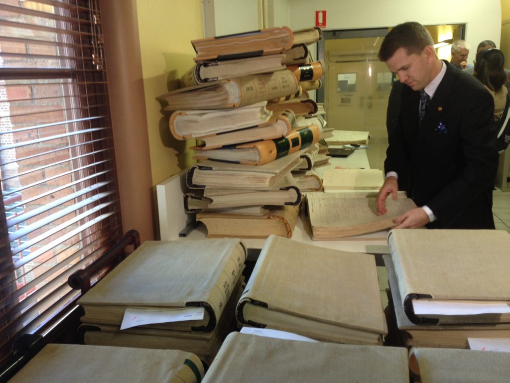 Queensland Attorney General Jarrod Bleijie looks through historic records progressively being put online. Queensland Attorney General Jarrod Bleijie looks through historic records progressively being put online.