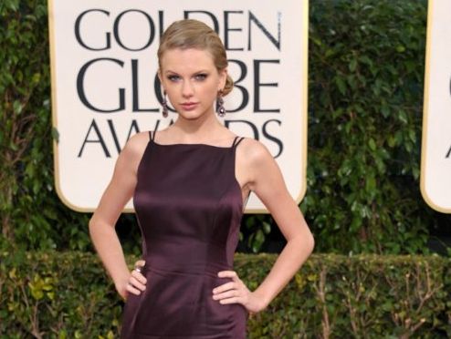 Musician Taylor Swift arriving at the 70th Annual Golden Globe Awards at the Beverly Hilton Hotel on Sunday Jan. 13, 2013, in Beverly Hills.
