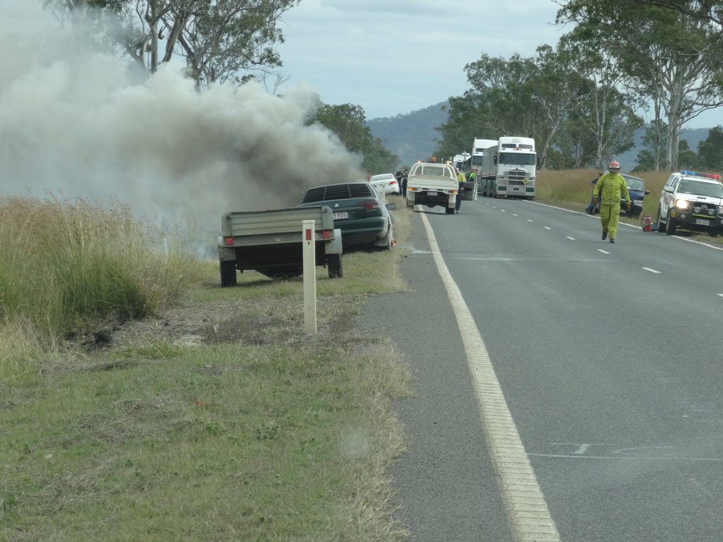 CAR FIRE: A family escaped without injury after a Holden Commodore caught on fire on the Dawson Hwy near Mt Alma. CAR FIRE: A family escaped without injury after a Holden Commodore caught on fire on the Dawson Hwy near Mt Alma.