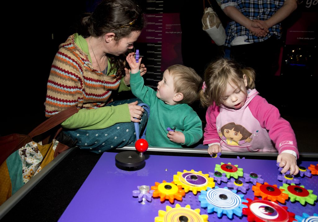 Katie Rutland, Phoenix and Harmony Ollier at the cog station.