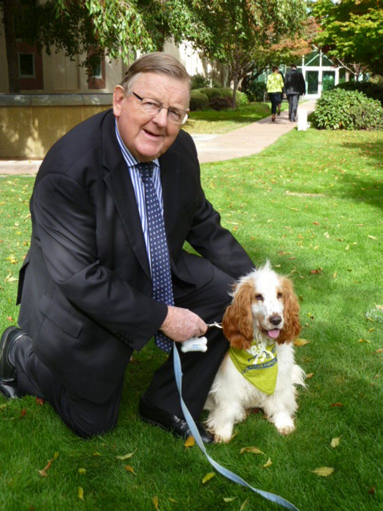 Member for Hinkler Paul Neville with a happy puppy at the Hounds on the Hill event in Canberra. Photo Contributed Member for Hinkler Paul Neville with a happy puppy at the Hounds on the Hill event in Canberra. Photo Contributed